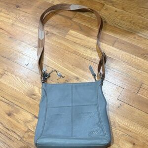 The Sak Gray Leather Crossbody with Tan Woven Strap